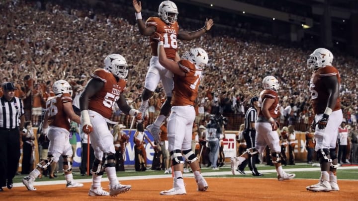 Sep 4, 2016; Austin, TX, USA; Texas Longhorns quarterback Tyrone Swoopes (18) celebrates with teammates after scoring during the first half against the Notre Dame Fighting Irish at Darrell K Royal-Texas Memorial Stadium. Mandatory Credit: Kevin Jairaj-USA TODAY Sports