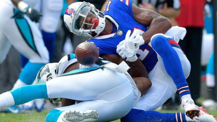 CHARLOTTE, NC - SEPTEMBER 17: James Bradberry #24 of the Carolina Panthers separates Zay Jones #11 of the Buffalo Bills from the ball during their game at Bank of America Stadium on September 17, 2017 in Charlotte, North Carolina. (Photo by Grant Halverson/Getty Images)