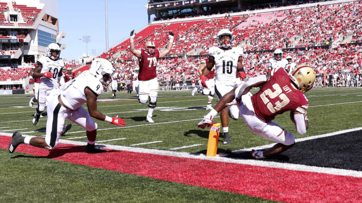 LOUISVILLE, KENTUCKY – OCTOBER 05: Travis Levy #23 of the Boston College Eagles dives into the endzone to score a touchdown in the game against the Louisville Cardinals during the fourth quarter at Cardinal Stadium on October 05, 2019 in Louisville, Kentucky. (Photo by Justin Casterline/Getty Images)