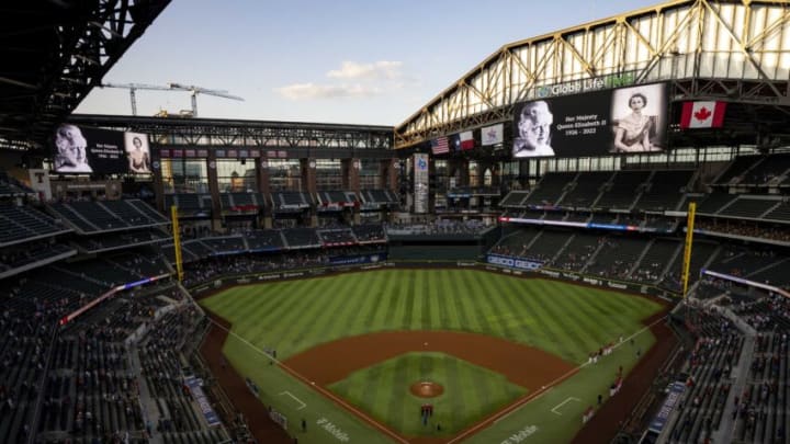 Sep 9, 2022; Arlington, Texas, USA; The Texas Rangers and the Toronto Blue Jays and fans observe a moment of silence before the game at the Globe Life Field in honor of the passing of Queen Elizabeth II. Mandatory Credit: Jerome Miron-USA TODAY Sports