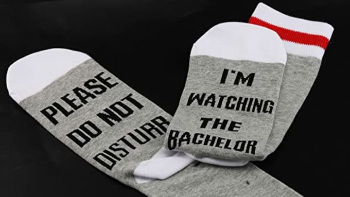 Discover GJTIM's novelty socks that say “Please Do Not Disturb, I’m Watching The Bachelor" which are available on Amazon.