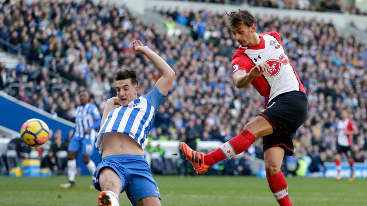 BRIGHTON, ENGLAND – OCTOBER 29: Manolo Gabbiadini of Southampton shoots past Lewis Dunk of Brighton and Hove Albion during the Premier League match between Brighton and Hove Albion and Southampton at Amex Stadium on October 29, 2017 in Brighton, England. (Photo by Henry Browne/Getty Images)