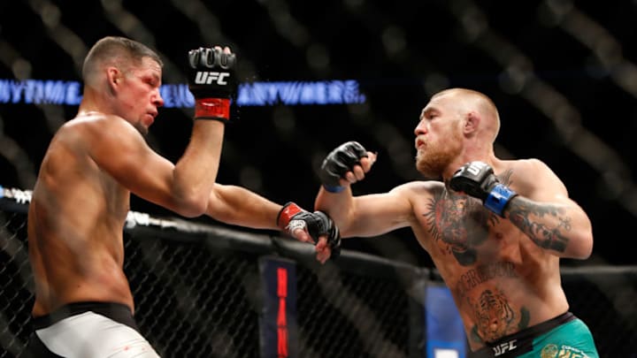 LAS VEGAS, NV - AUGUST 20: Nate Diaz (L) and Conor McGregor battle during their welterweight rematch at the UFC 202 event at T-Mobile Arena on August 20, 2016 in Las Vegas, Nevada. (Photo by Steve Marcus/Getty Images)