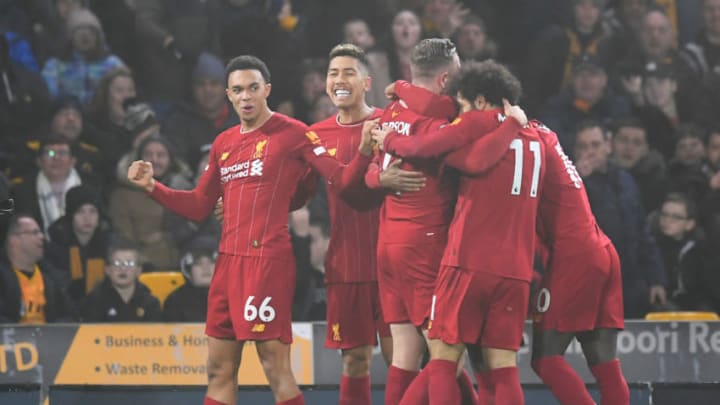 WOLVERHAMPTON, ENGLAND - JANUARY 23: Jordan Henderson of Liverpool celebrates with team-mates after scoring the opening goal during the Premier League match between Wolverhampton Wanderers and Liverpool FC at Molineux on January 23, 2020 in Wolverhampton, United Kingdom. (Photo by Michael Regan/Getty Images)