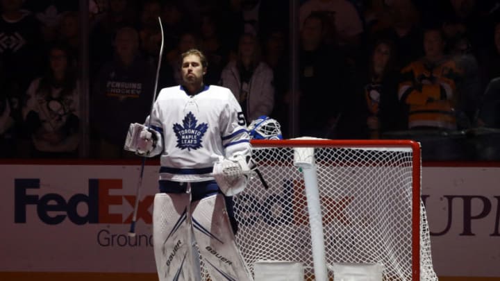 Toronto Maple Leafs goaltender Kasimir Kaskisuo (50) stands for the national anthem before making his NHL debut against the Pittsburgh Penguins at PPG PAINTS Arena. Mandatory Credit: Charles LeClaire-USA TODAY Sports