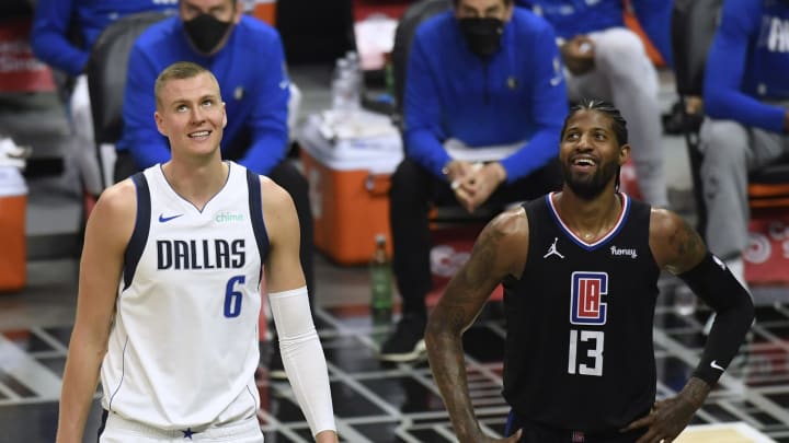 LOS ANGELES, CALIFORNIA – MAY 25: Paul George #13 of the LA Clippers and Kristaps Porzingis #6 of the Dallas Mavericks. (Photo by Harry How/Getty Images)