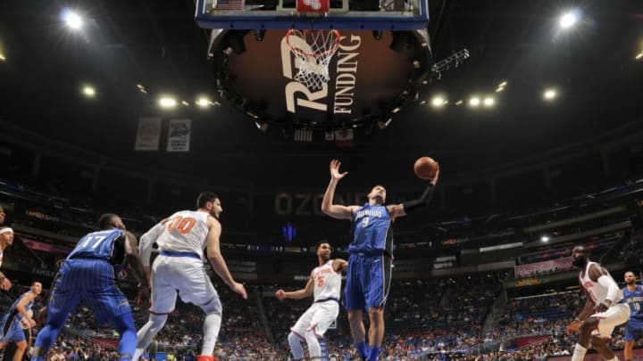 ORLANDO, FL - FEBRUARY 22: Nikola Vucevic #9 of the Orlando Magic handles the ball against the New York Knicks on February 22, 2018 at Amway Center in Orlando, Florida. NOTE TO USER: User expressly acknowledges and agrees that, by downloading and or using this photograph, User is consenting to the terms and conditions of the Getty Images License Agreement. Mandatory Copyright Notice: Copyright 2018 NBAE (Photo by Fernando Medina/NBAE via Getty Images)