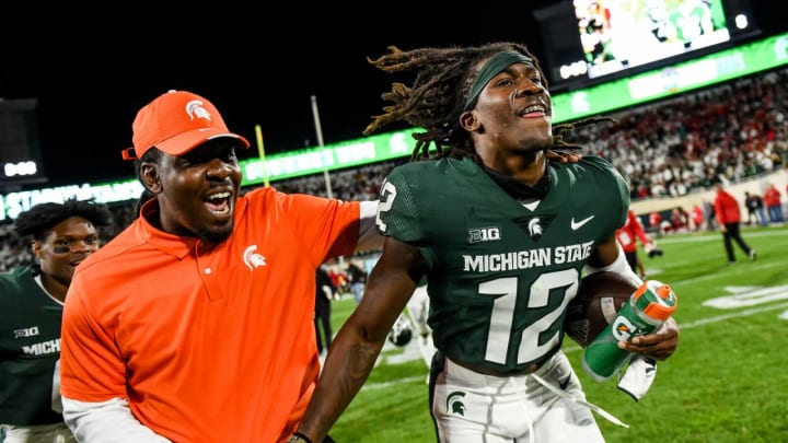 Michigan State’s Chester Kimbrough, right, celebrates after beating Nebraska in overtime on Saturday, Sept. 25, 2021, at Spartan Stadium in East Lansing.210925 Msu Nebraska 275a