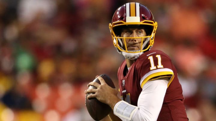 LANDOVER, MD - AUGUST 24: Quarterback Alex Smith #11 of the Washington Redskins looks to pass against the Denver Broncos in the first half during a preseason game at FedExField on August 24, 2018 in Landover, Maryland. (Photo by Patrick Smith/Getty Images)
