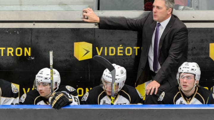 BLAINVILLE-BOISBRIAND, QC - OCTOBER 02: Head coach Jim Hulton of the Charlottetown Islanders looks on during the QMJHL game against the Blainville-Boisbriand Armada at the Centre d'Excellence Sports Rousseau on October 2, 2015 in Blainville-Boisbriand, Quebec, Canada. The Blainville-Boisbriand Armada defeated the Charlottetown Islanders 2-1. (Photo by Minas Panagiotakis/Getty Images)