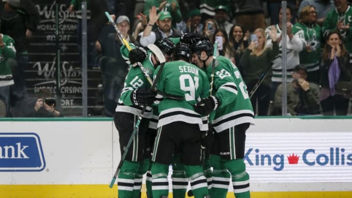DALLAS, TX - NOVEMBER 05: Dallas Stars center Radek Faksa (12) celebrates scoring a goal with his teammates during the game between the Dallas Stars and the Colorado Avalanche on November 05, 2019 at the American Airlines Center in Dallas, Texas. (Photo by Matthew Pearce/Icon Sportswire via Getty Images)