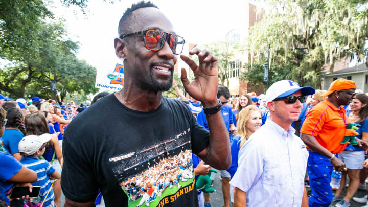 Jevon Kearse walks with other Florida Alums and athletes before the Florida Gators arrived for Gator Walk as they were greeted by fans before playing the Tennessee Volunteers Saturday September 25, 2021 at Ben Hill Griffin Stadium in Gainesville, FL. [Doug Engle/GainesvilleSun]2021Flgai 092521 Gatorsvsvolsgatorwalk