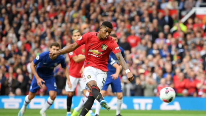 MANCHESTER, ENGLAND – AUGUST 11: Marcus Rashford of Manchester United scores his team’s first goal from the penalty spot during the Premier League match between Manchester United and Chelsea FC at Old Trafford on August 11, 2019 in Manchester, United Kingdom. (Photo by Michael Regan/Getty Images)