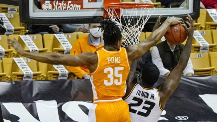 Dec 30, 2020; Columbia, Missouri, USA; Tennessee Volunteers guard Yves Pons (35) blocks a shot by Missouri Tigers forward Jeremiah Tilmon (23) during the first half at Mizzou Arena. Mandatory Credit: Jay Biggerstaff-USA TODAY Sports