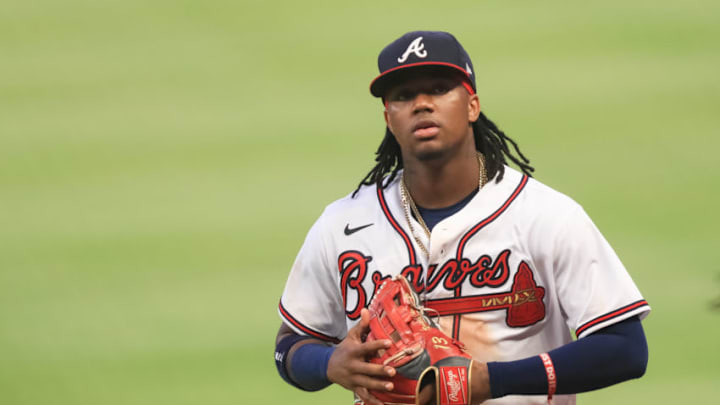 ATLANTA, GA - AUGUST 4: Ronald Acuna Jr. #13 of the Atlanta Braves looks on during a game against the Toronto Blue Jays at Truist Park on August 4, 2020 in Atlanta, Georgia. (Photo by Carmen Mandato/Getty Images)