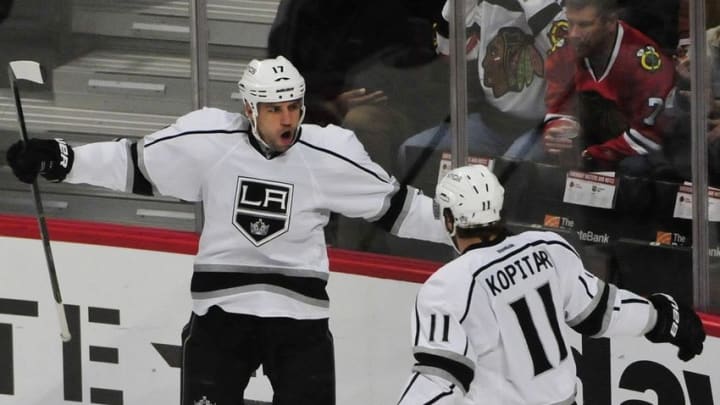 Mar 14, 2016; Chicago, IL, USA; Los Angeles Kings left wing Milan Lucic (17) celebrates with center Anze Kopitar (11) after scoring a goal against the Chicago Blackhawks during the first period at the United Center. Mandatory Credit: David Banks-USA TODAY Sports