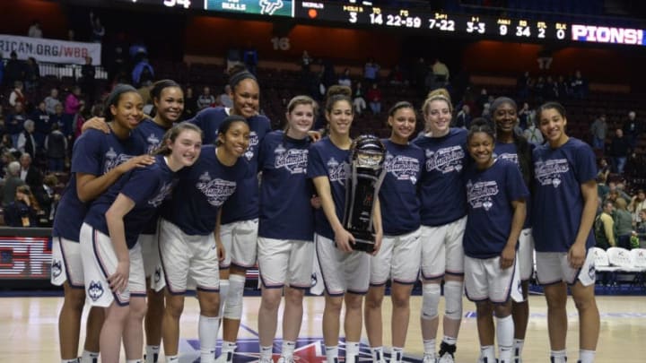 UNCASVILLE, CT - MARCH 06: UConn Huskies hold the American Athletic Conference Champions trophy after the game as the South Florida Bulls take on the UConn Huskies on March 06, 2018 at the Mohegan Sun Arena in Uncasville, Connecticut. (Photo by Williams Paul/Icon Sportswire via Getty Images)