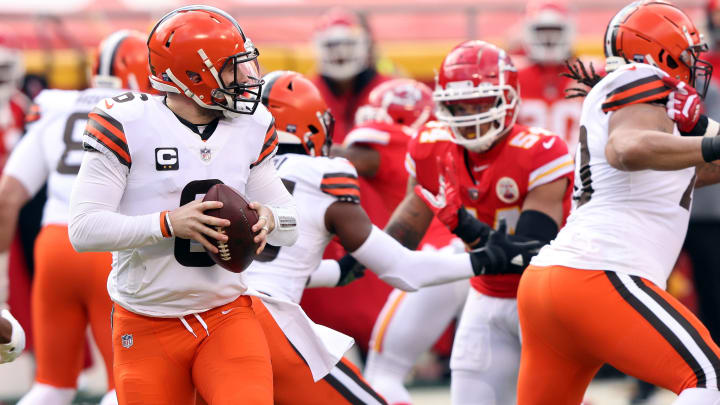 KANSAS CITY, MISSOURI - JANUARY 17: Quarterback Baker Mayfield #6 of the Cleveland Browns drops back to pass against the defense of the Kansas City Chiefs during the AFC Divisional Playoff game at Arrowhead Stadium on January 17, 2021 in Kansas City, Missouri. (Photo by Jamie Squire/Getty Images)