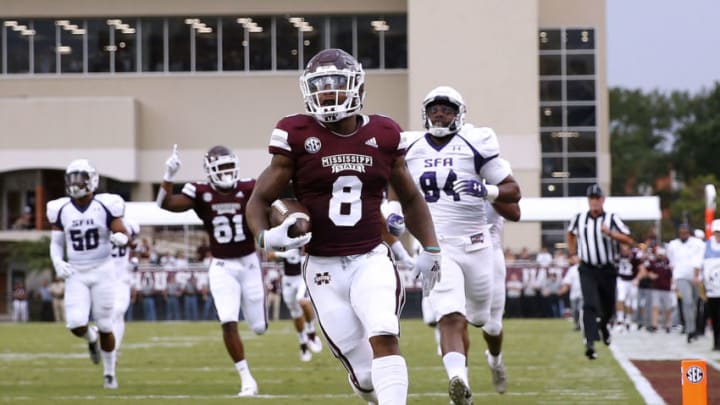 STARKVILLE, MS - SEPTEMBER 01: Kylin Hill #8 of the Mississippi State Bulldogs scores a touchdown during the first half against the Stephen F. Austin Lumberjacks at Davis Wade Stadium on September 1, 2018 in Starkville, Mississippi. (Photo by Jonathan Bachman/Getty Images)