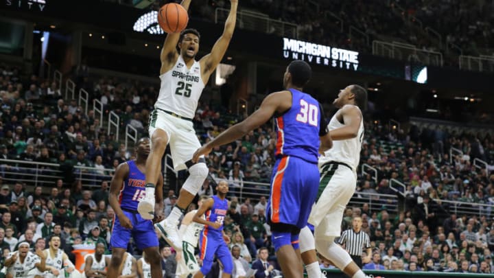 EAST LANSING, MI - DECEMBER 31: Kenny Goins #25 of the Michigan State Spartans dunks the ball against the Savannah State Tigers at Breslin Center on December 31, 2017 in East Lansing, Michigan. (Photo by Rey Del Rio/Getty Images)