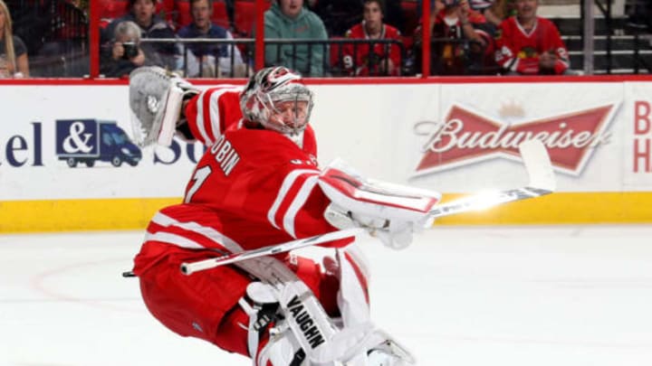 RALEIGH, NC – MARCH 23: Anton Khudobin #31 of the Carolina Hurricanes watches the puck as it goes wide of the net during an NHL game against the Chicago Blackhawks at PNC Arena on March 23, 2015 in Raleigh, North Carolina. (Photo by Gregg Forwerck/NHLI via Getty Images)