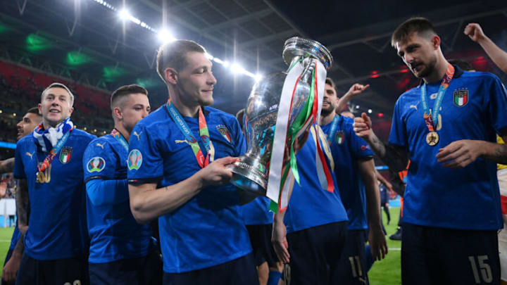 LONDON, ENGLAND - JULY 11: Andrea Belotti of Italy celebrates with The Henri Delaunay Trophy following his team's victory in the UEFA Euro 2020 Championship Final between Italy and England at Wembley Stadium on July 11, 2021 in London, England. (Photo by Laurence Griffiths/Getty Images)