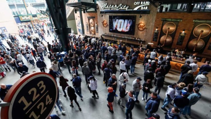 Baseball fans walk around Comerica Park during Detroit Tigers' home opening day of the 2023 season in Detroit on Thursday, April 6, 2023.