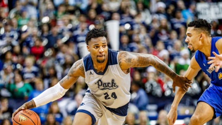 RENO, NV - DECEMBER 15: Jordan Caroline #24 of the Nevada Wolf Pack drives to the basket during the second half of the game between the Nevada Wolf Pack and the South Dakota State Jackrabbits at Lawlor Events Center on December 15, 2018 in Reno, Nevada. (Photo by Jonathan Devich/Getty Images)