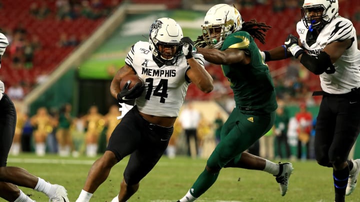 TAMPA, FLORIDA – NOVEMBER 23: Antonio Gibson #14 of the Memphis Tigers scores a touchdown during a game against the South Florida Bulls at Raymond James Stadium on November 23, 2019 in Tampa, Florida. (Photo by Mike Ehrmann/Getty Images)