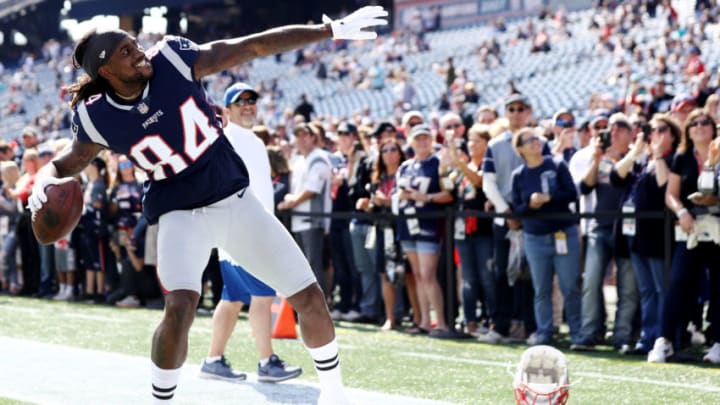 FOXBOROUGH, MA - SEPTEMBER 30: Cordarrelle Patterson #84 of the New England Patriots throws a football into the stands to fans before the game against the Miami Dolphins at Gillette Stadium on September 30, 2018 in Foxborough, Massachusetts. (Photo by Maddie Meyer/Getty Images)