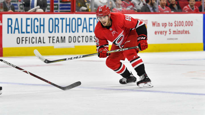 RALEIGH, NC – NOVEMBER 07: Carolina Hurricanes Defenceman Roland McKeown (55) passes the puck during a game between the Florida Panthers and the Carolina Hurricanes at the PNC Arena in Raleigh, NC on November 7 2017. Carolina defeated Florida 3-1. (Photo by Greg Thompson/Icon Sportswire via Getty Images)