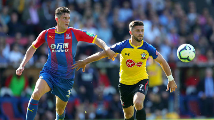 LONDON, ENGLAND - SEPTEMBER 01: Shane Long of Southampton holds off Martin Kelly of Crystal Palace during the Premier League match between Crystal Palace and Southampton FC at Selhurst Park on September 1, 2018 in London, United Kingdom. (Photo by Alex Morton/Getty Images)