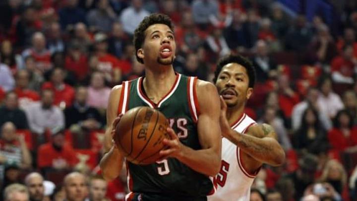 Apr 27, 2015; Chicago, IL, USA; Milwaukee Bucks guard Michael Carter-Williams (5) drives to the basket against Chicago Bulls guard Derrick Rose (1) in game five of the first round of the 2015 NBA Playoffs at United Center. Mandatory Credit: Kamil Krzaczynski-USA TODAY Sports Apr 27, 2015; Chicago, IL, USA; Milwaukee Bucks guard Michael Carter-Williams (5) drives to the basket against Chicago Bulls guard Derrick Rose (1) in game five of the first round of the 2015 NBA Playoffs at United Center. Mandatory Credit: Kamil Krzaczynski-USA TODAY Sports