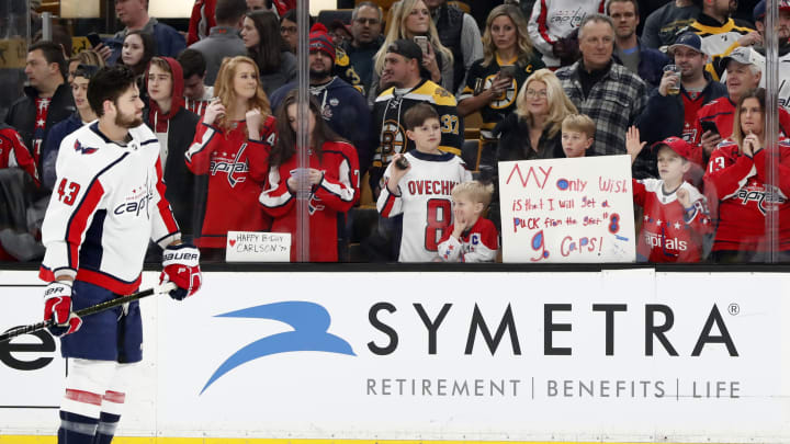 BOSTON, MA – JANUARY 10: Caps fans with signs before a game between the Boston Bruins and the Washington Capitals on January 10, 2019, at TD Garden in Boston, Massachusetts. (Photo by Fred Kfoury III/Icon Sportswire via Getty Images)