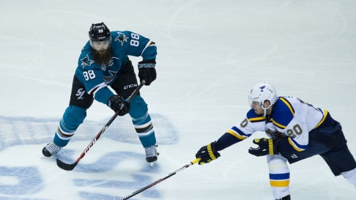 May 25, 2016; San Jose, CA, USA; St. Louis Blues left wing Alexander Steen (20) reaches for the puck against San Jose Sharks defenseman Brent Burns (88) during the second period in game six of the Western Conference Final of the 2016 Stanley Cup Playoffs at SAP Center at San Jose. Mandatory Credit: Kelley L Cox-USA TODAY Sports