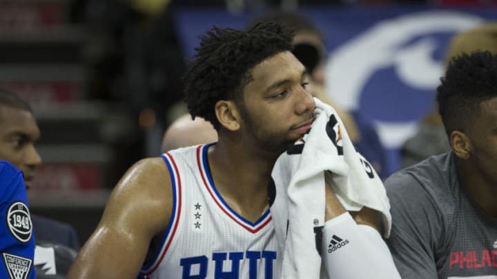PHILADELPHIA, PA - DECEMBER 7: Jahlil Okafor #8 of the Philadelphia 76ers watches the game against the San Antonio Spurs from the bench on December 7, 2015 at the Wells Fargo Center in Philadelphia, Pennsylvania. NOTE TO USER: User expressly acknowledges and agrees that, by downloading and or using this photograph, User is consenting to the terms and conditions of the Getty Images License Agreement. The Spurs defeated the 76ers 119-68. (Photo by Mitchell Leff/Getty Images)