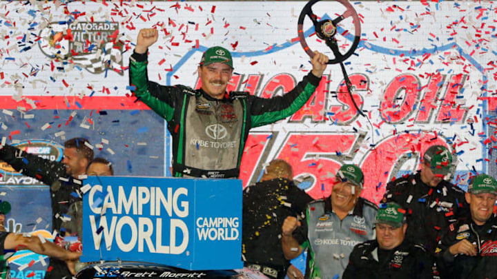 PHOENIX, AZ - NOVEMBER 09: Brett Moffitt, driver of the #16 KOBE Toyopet Toyota, celebrates in Victory Lane after winning the NASCAR Camping World Truck Series Lucas Oil 150 at ISM Raceway on November 9, 2018 in Phoenix, Arizona. (Photo by Jonathan Ferrey/Getty Images)