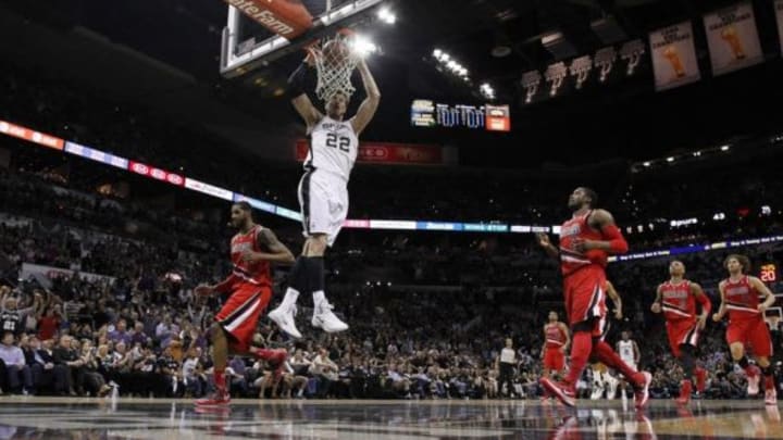 May 14, 2014; San Antonio, TX, USA; San Antonio Spurs forward Tiago Splitter (22) dunks against the Portland Trail Blazers in game five of the second round of the 2014 NBA Playoffs at AT&T Center. Mandatory Credit: Soobum Im-USA TODAY Sports