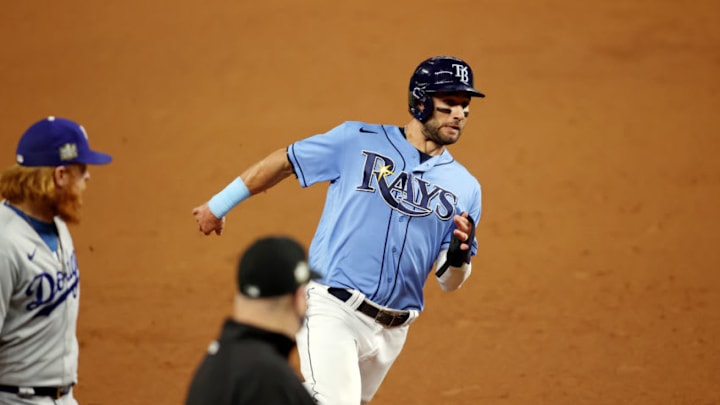Oct 25, 2020; Arlington, Texas, USA; Tampa Bay Rays center fielder Kevin Kiermaier (39) runs to third base on his way to score against the Los Angeles Dodgers on an RBI triple hit by first baseman Yandy Diaz (not pictured) during the third inning during game five of the 2020 World Series at Globe Life Field. Mandatory Credit: Tim Heitman-USA TODAY Sports