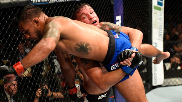 UNIONDALE, NY - JULY 22: (R-L) Darren Elkins attempts to take down Dennis Bermudez in their featherweight bout during the UFC Fight Night event inside the Nassau Veterans Memorial Coliseum on July 22, 2017 in Uniondale, New York. (Photo by Josh Hedges/Zuffa LLC/Zuffa LLC via Getty Images)