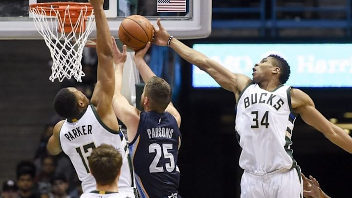 Nov 12, 2016; Milwaukee, WI, USA; Milwaukee Bucks forward Jabari Parker (12) and forward Giannis Antetokounmpo (34) blocks a shot by Memphis Grizzlies forward Chandler Parsons (25) in the fourth quarter at BMO Harris Bradley Center. The Bucks beat the Grizzlies 106-96. Mandatory Credit: Benny Sieu-USA TODAY Sports
