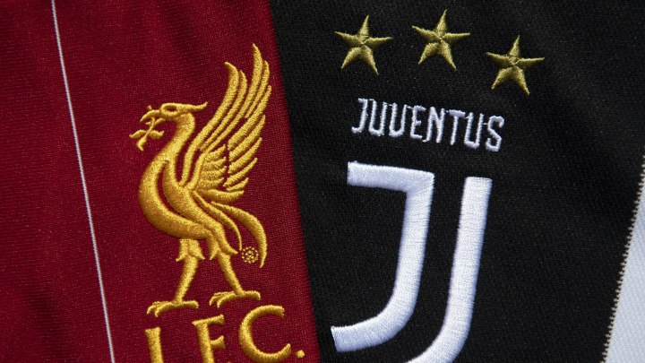 The Juventus and Liverpool club crests (Photo by Visionhaus)
