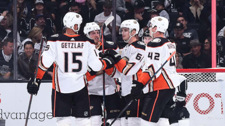 LOS ANGELES, CA - SEPTEMBER 29: Ryan Getzlaf #15, Rickard Rakell #67, Troy Terry #61 and Josh Manson #42 of the Anaheim Ducks celebrate Terry's first-period goal during the preseason game against the Los Angeles Kings at STAPLES Center on September 29, 2018 in Los Angeles, California. (Photo by Juan Ocampo/NHLI via Getty Images)