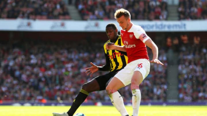 LONDON, ENGLAND – SEPTEMBER 29: Abdoulaye Doucoure of Watford challenges for the ball with Rob Holding of Arsenal during the Premier League match between Arsenal FC and Watford FC at Emirates Stadium on September 29, 2018 in London, United Kingdom. (Photo by Catherine Ivill/Getty Images)