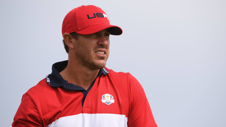 Sep 26, 2021; Haven, Wisconsin, USA; Team USA player Brooks Koepka follows his shot from the fourth tee during day three singles rounds for the 43rd Ryder Cup golf competition at Whistling Straits. Mandatory Credit: Orlando Ramirez-USA TODAY Sports