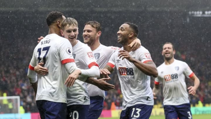 WATFORD, ENGLAND - OCTOBER 06: Joshua King of Bournemouth is congratulated by team-mates Simon Francis, David Brooks and Callum Wilson after he makes it 3-0 during the Premier League match between Watford FC and AFC Bournemouth at Vicarage Road on October 6, 2018 in Watford, United Kingdom. (Photo by AFC Bournemouth/AFC Bournemouth via Getty Images)