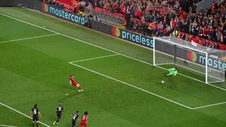 LIVERPOOL, ENGLAND – SEPTEMBER 18: James Milner of Liverpool scores their second goal from the penalty spot during the Group C match of the UEFA Champions League between Liverpool and Paris Saint-Germain at Anfield on September 18, 2018 in Liverpool, United Kingdom. (Photo by Alex Livesey – UEFA/UEFA via Getty Images)