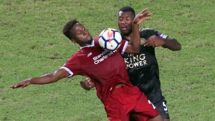 HONG KONG - JULY 22: Divock Origi of Liverpool battles with Wes Morgan Leicester City of during the Premier League Asia Trophy match between Liverpool FC and Leicester City FC at Hong Kong Stadium on July 22, 2017 in Hong Kong, Hong Kong. (Photo by Stanley Chou/Getty Images )