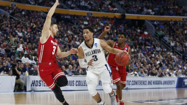 Mar 18, 2017; Buffalo, NY, USA; Villanova Wildcats guard Josh Hart (3) drives to the basket against Wisconsin Badgers guard Zak Showalter (3) in the first half during the second round of the 2017 NCAA Tournament at KeyBank Center. Mandatory Credit: Timothy T. Ludwig-USA TODAY Sports