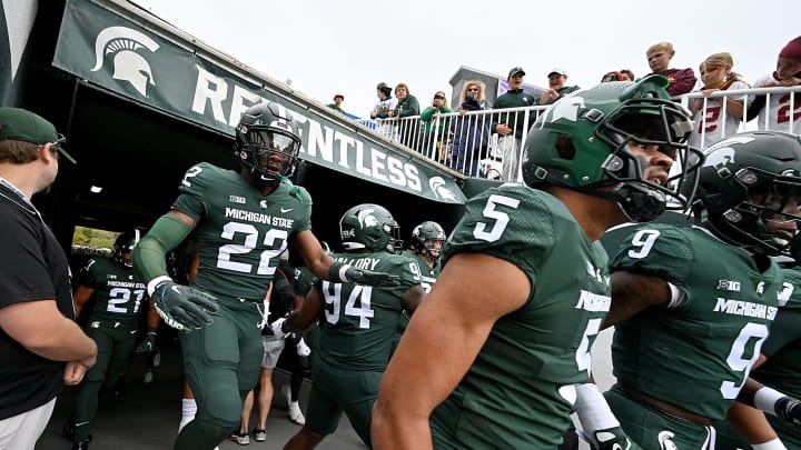 Sep 24, 2022; East Lansing, Michigan, USA; Michigan State Spartans run onto the field at Spartan Stadium before their game against the Minnesota Gophers. Mandatory Credit: Dale Young-USA TODAY Sports